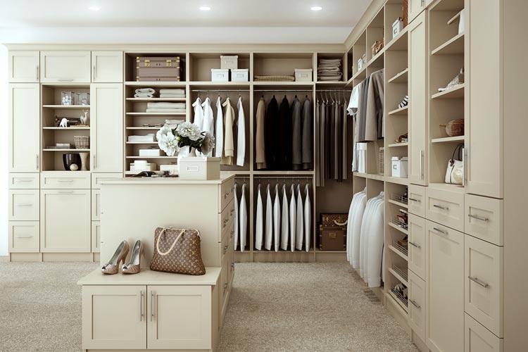 off white custom closet system in walk in closet